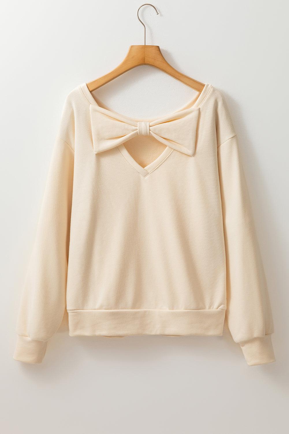 Bow Cutout Round Neck Long Sleeve Sweatshirt - Trendy by Luna