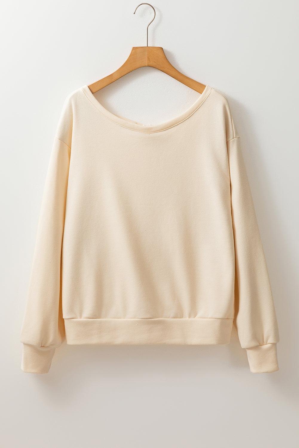 Bow Cutout Round Neck Long Sleeve Sweatshirt - Trendy by Luna